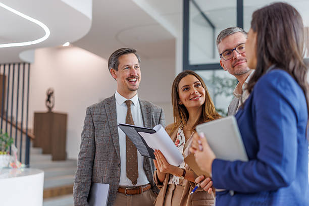 istock Business colleagues collaborating on project documentation in office 2252181199