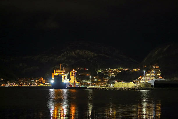 Namsos, Norway - December 13, 2025 : The harbour in the snowy nightly Norwegian town Namsos in December