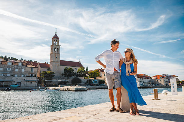 istock Delighted Mature Caucasian Couple Walking by Coastal Sutivan 2252184074