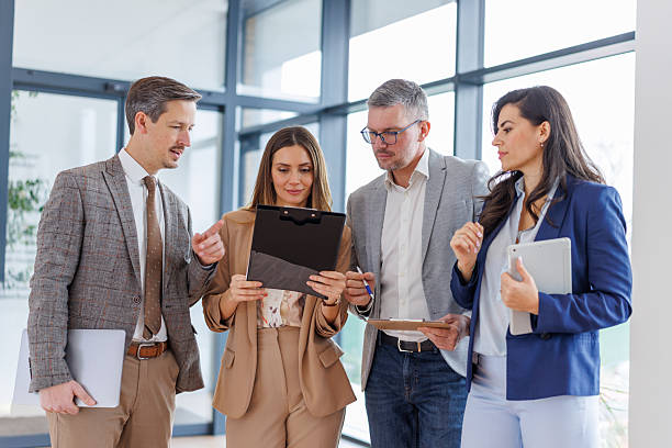 istock Business professionals discussing strategy during collaborative office meeting 2252184329