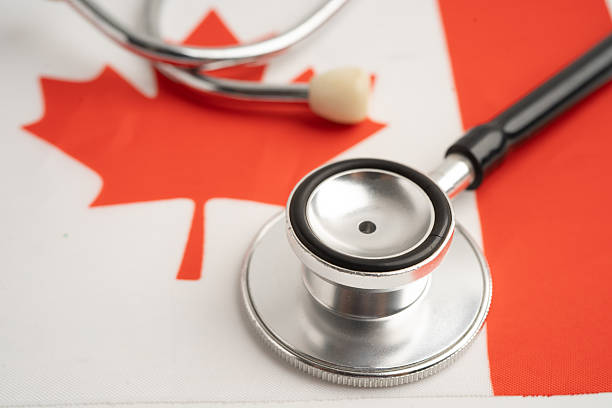 istock Canada flag with stethoscope, Business and finance. 2252184746
