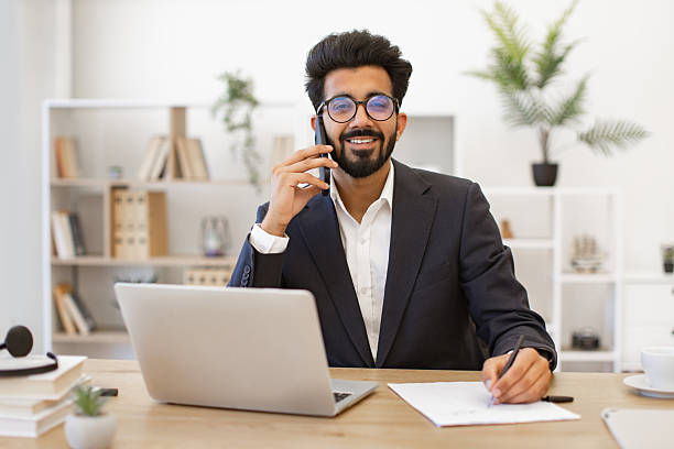 istock Indian Businessman on Phone 2252192274