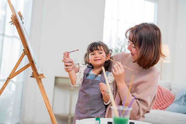 istock Creative time with a child in a bright living room on a sunny afternoon 2252192399