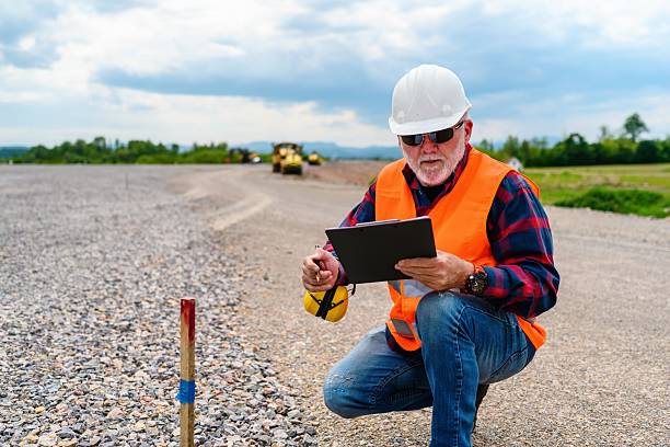 istock The engineer checks the PIN against the road plan 2252192468