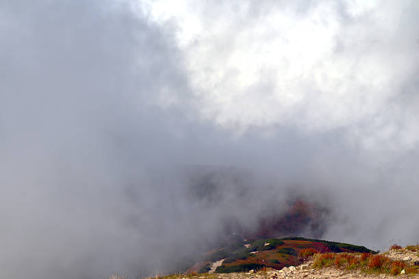 Autumn Mountainscape Shrouded in clouds