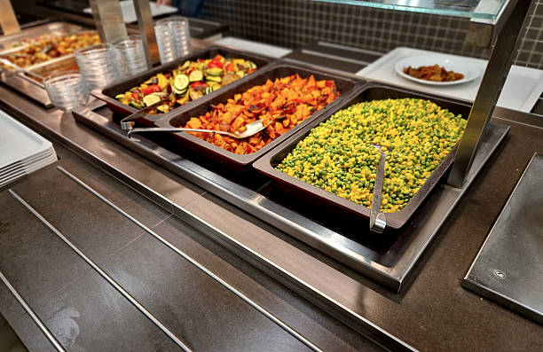 istock buffet with various types of roasted vegetables. Roasted sweet potato cube. Roasted vegetables, zucchini, pepper and eggplant. mixture of corn. pea. Sweet potatoes are sweet and rich in antioxidants. 2252194989