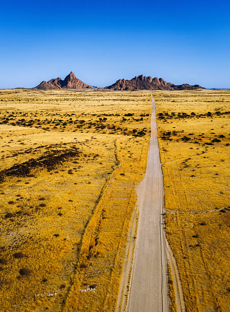 istock Desert Road to Spitzkoppe Mountains in Namibia 2252196533