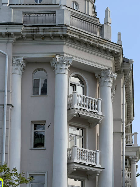 istock Historic building features beautiful columns and balconies under a bright blue sky 2252197325
