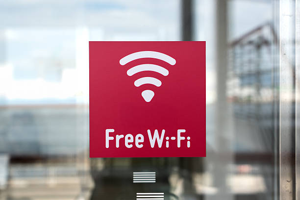 istock Red Square Free Wi-Fi Signage on a Glass Window 2252205747