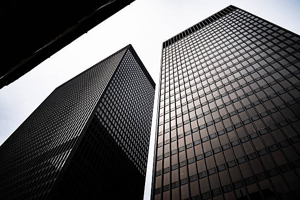 istock Modern Twin Office Towers Low Angle 2252209566