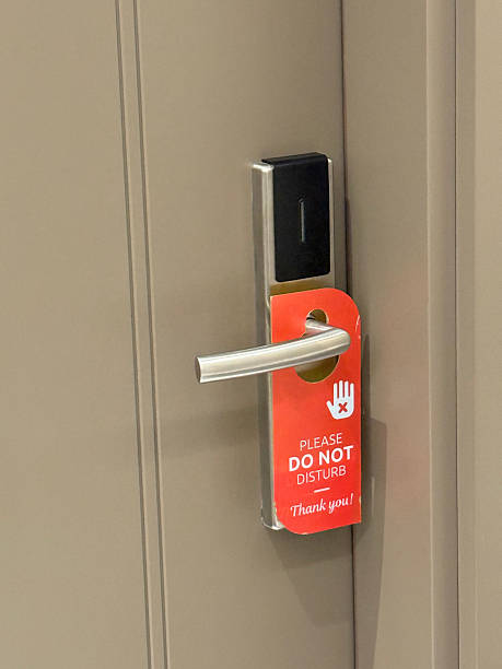 istock Do not disturb sign on hotel door handle conveys privacy and discretion request 2252210752