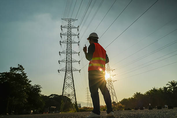 istock Male Engineer Silhouette Checking Electrical Transmission System Safety 2252210786