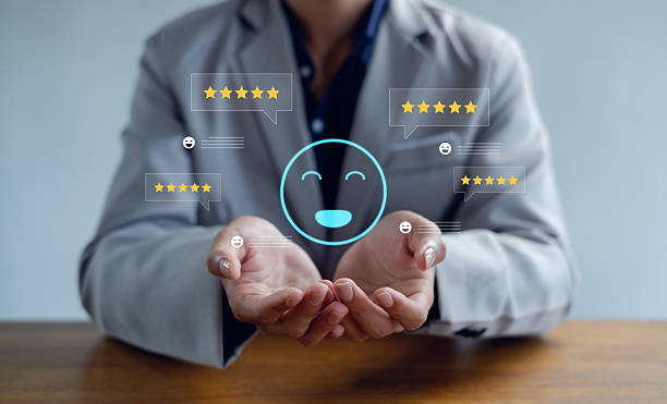 istock Hands presenting a glowing happy face with five star rating icons represent customer satisfaction, positive feedback, service quality, user experience, and business reputation concept. 2252212962