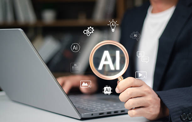 istock Artificial intelligence search and selection concept with magnifying glass highlighting AI icons. Represents finding the right AI tools, automation solutions, and intelligent digital systems. 2252214128