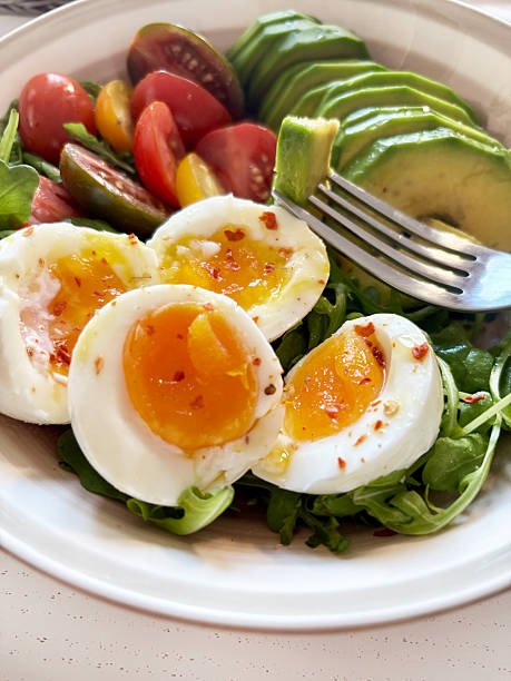 istock Mediterranean salad with avocado, hard-boiled eggs and cherry tomatoes. 2252215872
