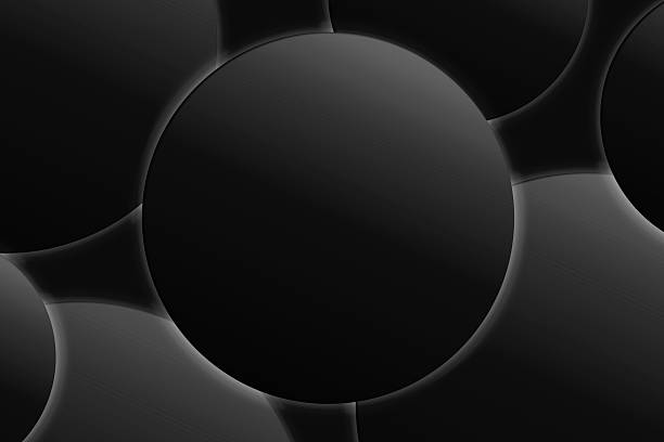 Seamless abstract composition of overlapping black spheres with soft highlights and a glossy finish.