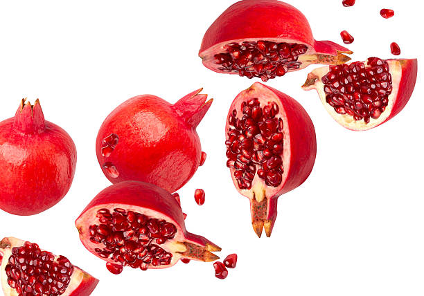 istock Falling Pomegranate fruit isolated on white background with clipping path, full depth of field 2252218555
