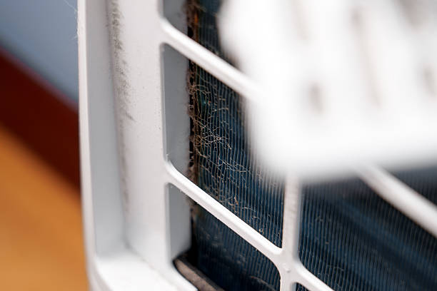 istock Disassembled air dehumidifier during maintenance with dusty radiator 2252218847