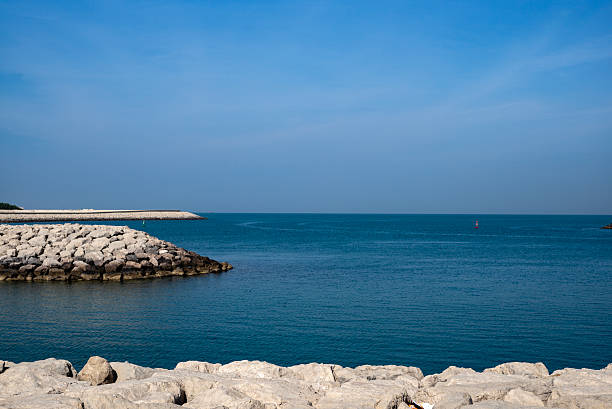 istock Tranquil Persian Gulf Seascape with Breakwater in Abu Dhabi 2252219501