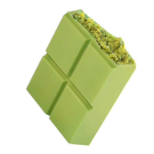 istock Flying Dubai chocolate bar piece isolated on white. Levitating Dubai chocolate with pistachio nuts, cream and kadayif. Dubai Chocolate  Top view. Flat lay.  2252220947