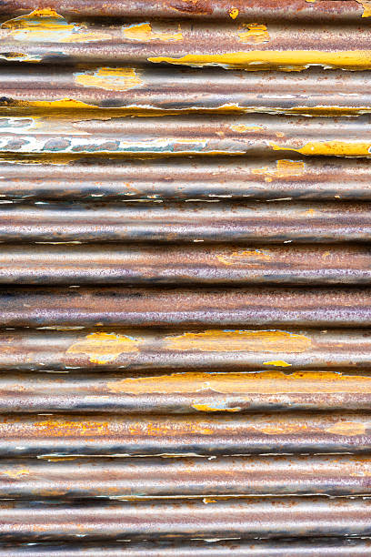 istock Abstract Grunge Background of Horizontal Rusted Metal Waves and Oxidized Surface 2252223334