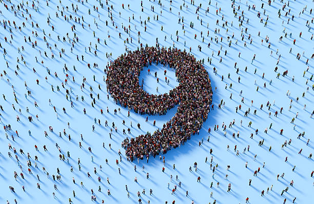 Human crowd forming number 9 on blue background.