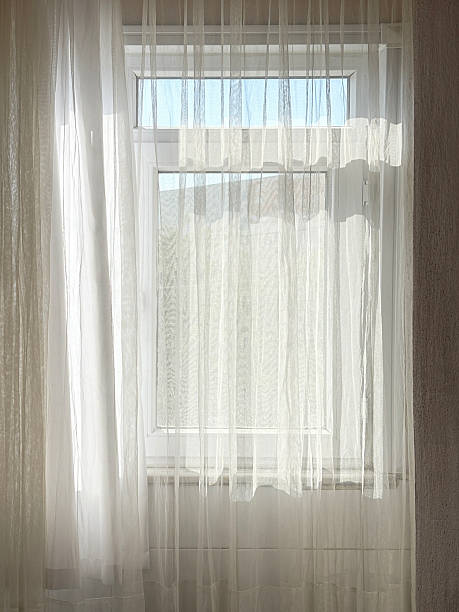 istock Tulle netting curtain on the window 2252228263