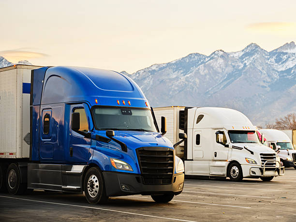 istock Semi Trucks Parked on a Winter Morning 2252230273