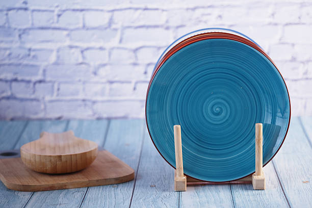 istock Colorful decorative plates displayed on a wooden table 2252231398