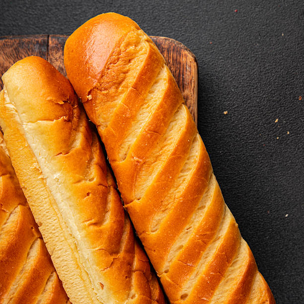 istock Fresh bun for hot dog natural baked goods soft ingredient appetizer fresh tasty table setting gourmet food background on the table rustic food top view copy space 2252234372