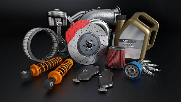 istock Car parts and tools are displayed on a dark surface in a workshop environment showing essential components for vehicle maintenance 2252236493