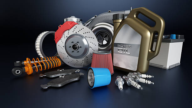 istock Car parts and tools are displayed on a dark surface in a workshop environment showing essential components for vehicle maintenance 2252236503