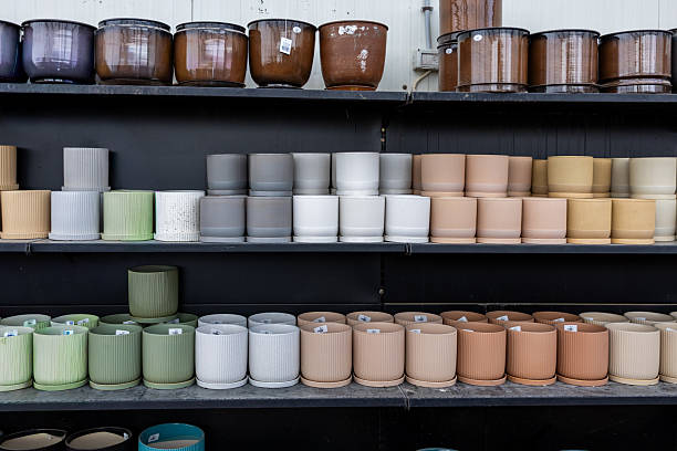 istock Ceramic Plant Pots Displayed in Flower Shop Interior, Modern Retail Shelving 2252244210