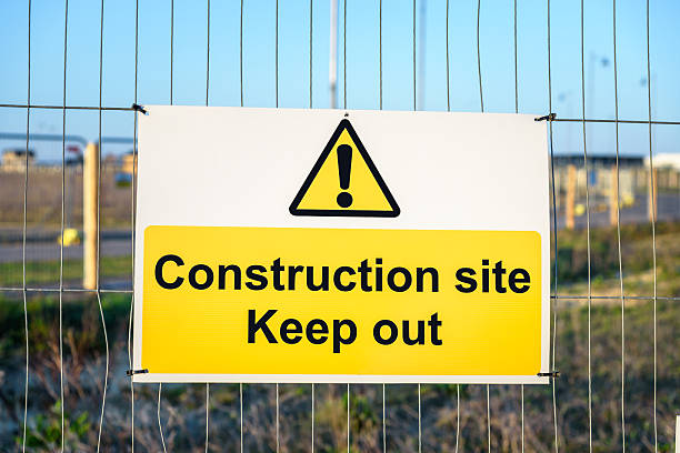 istock Keep out warning sign on a fence of a building site 2252260445