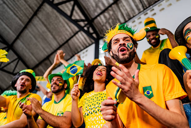 istock Excited brazilian fan celebrating during sporting event 2252265375