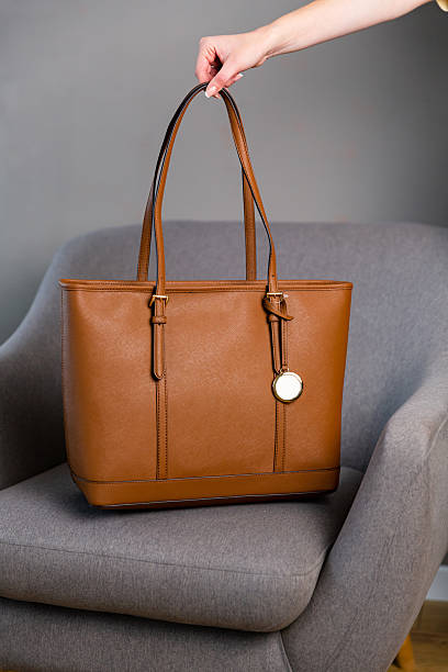 istock Stylish women’s caramel brown handbag 2252266369
