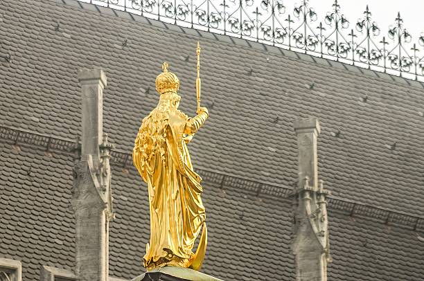 The famous art is located in front of Main Marien Platz building