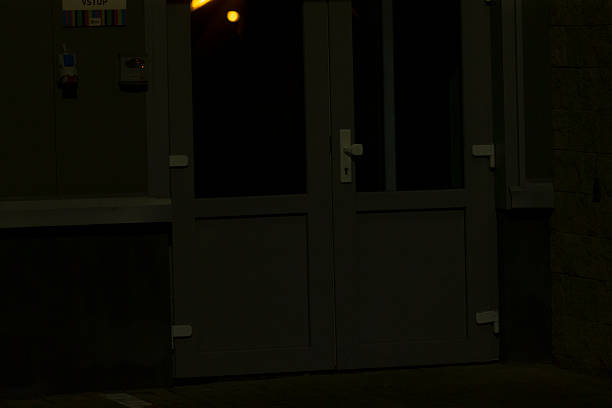 istock Secure city doorway, Dimly lit entryway with secure features visible 2252267496