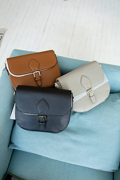istock Three handbags on the chair. 2252268711