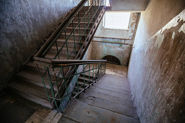 istock Old abandoned building. Walls with peeled paint 2252269425