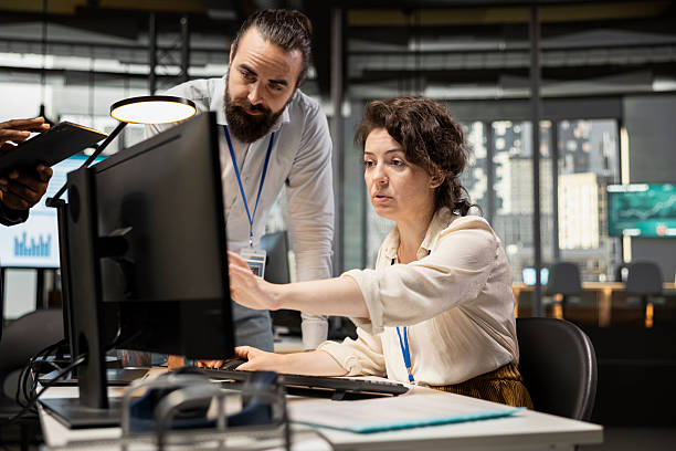 istock Professional colleagues team analyzing online graphs and resource allocation 2252270226