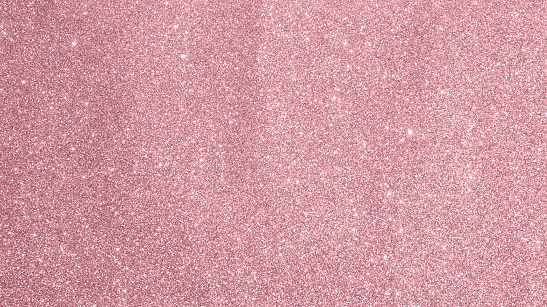 istock Abstract rose gold pink glitter sparkle texture background 2252275606