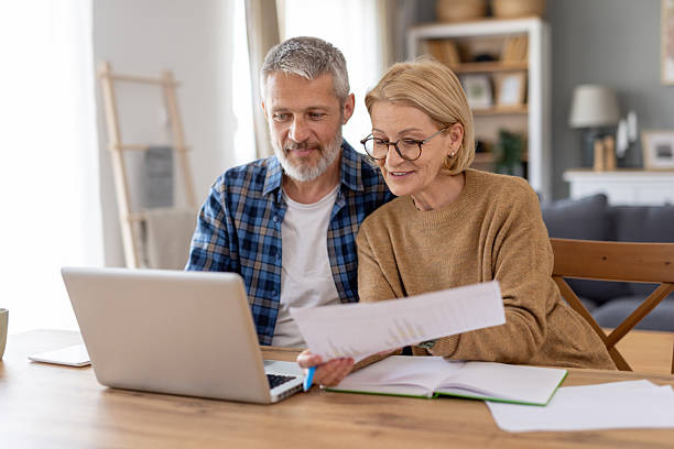 istock Couple Discovering Ideas and Concepts Together at Home 2252276347
