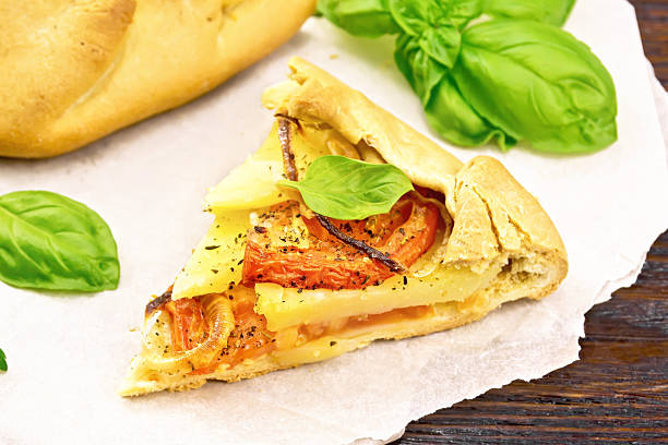 istock Galette of tomato and potato on parchment 2252276397