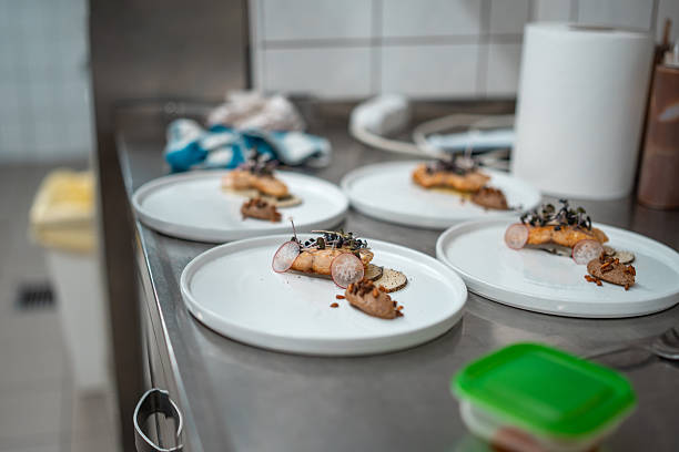 istock Elegant Plated Dishes in a Professional Kitchen with Bright Lighting and Modern Stainless Steel Surfaces 2252276582