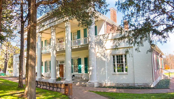 Nashville, TN - USA: President Andrew Jackson's The Hermitage with autumn colors, sunlight and shadow, view from the front