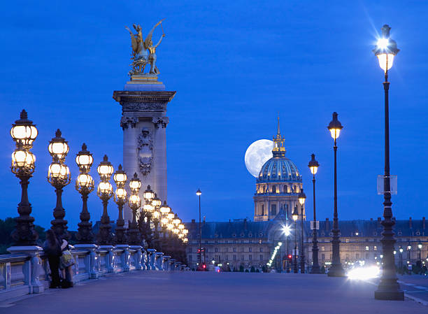 The famous Alexandre III Bridge at sunset in Paris, France