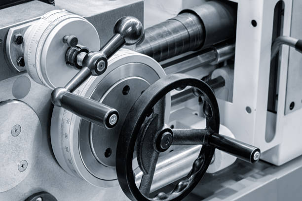 Control disk of metalworking machine with applied measuring ruler and control handle. metalworking industrial machines concept.
