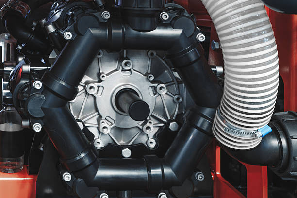 istock large engine with many tubes, bolts and various parts. Auto service concept background 2252277820