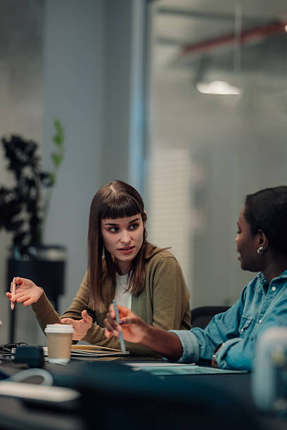 istock Women collaborating on a project during a business meeting 2252278159
